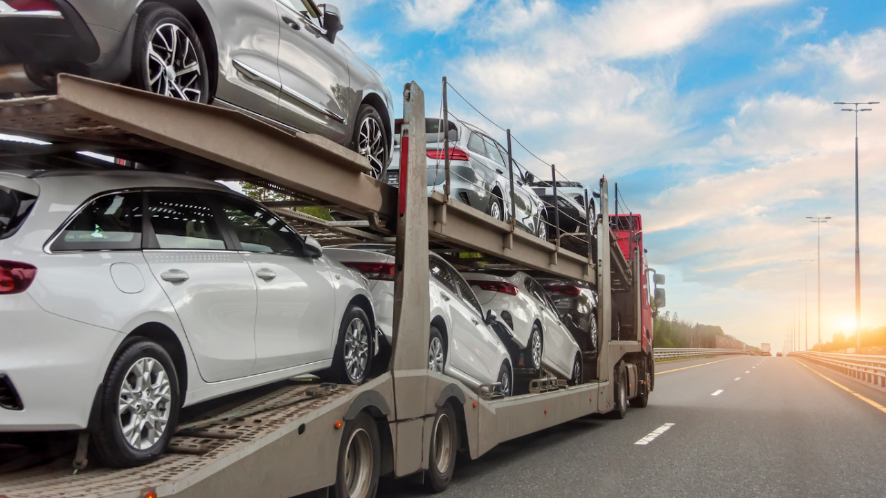 Auto transport truck hauling cars cross country